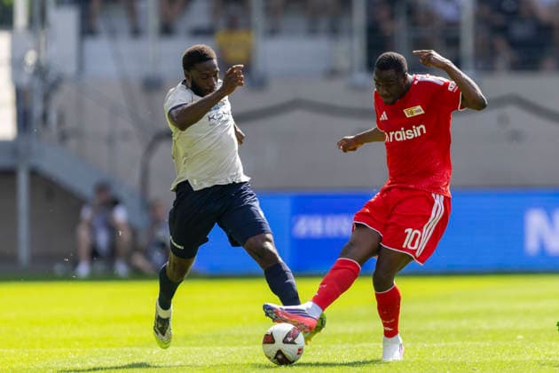 GER, Jena, Fussball, Testspiel, FC Carl-Zeiss Jena vs. 1. FC Union Berlin im Bild v.l.: Malik Talabidi (FC Carl-Zeiss Jena 12), Ilyas Ansah (1. FC Union Berlin 10), Zweikampf 12.07.2026, Ernst-Abbe Sportfeld Jena DFB REGULATIONS PROHIBIT ANY USE OF PHOTOGRAPHS AS IMAGE SEQUENCES AND OR QUASI-VIDEO, *** GER, Jena, Soccer, Friendly Match, FC Carl Zeiss Jena vs. 1. FC Union Berlin (pictured, from left): Malik Talabidi (FC Carl Zeiss Jena, 12), Ilyas Ansah (1. FC Union Berlin, 10), tackle, July 12, 2026, Ernst Abbe Sportfeld, Jena. DFB regulations prohibit any use of photographs as image sequences and or quasi-video, Copyright: HMBxMedia PaulxFritz