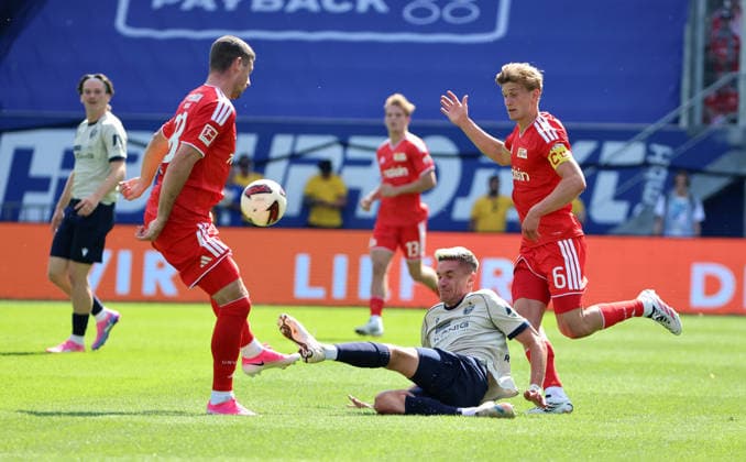 Andrej Ilic, Sören Reddemann, Aljoscha Kemlein Zweikampf Spielszene Aktion Fußball Fussball Testspiel Saison 2026 2027 12.07.2026 FC Carl Zeiss Jena vs.1.FC Union Berlin FCU DFL regulations prohibit any use of photographs as image sequences and or quasi-video. *** Andrej Ilic, Sören Reddemann, Aljoscha Kemlein, one-on-one, game scene, action, sports, soccer, soccer, friendly match, 2026–2027 season, December 7, 2026, FC Carl Zeiss Jena vs. 1. FC Union Berlin, FCU. DFL regulations prohibit any use of photographs as image sequences and or quasi-video.