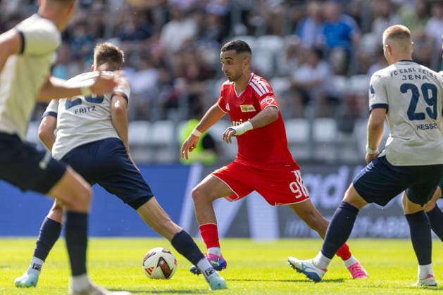GER, Jena, Fussball, Testspiel, FC Carl-Zeiss Jena vs. 1. FC Union Berlin im Bild v.l.: Livan Burcu (1. FC Union Berlin 09), Aktion mit Ball 12.07.2026, Ernst-Abbe Sportfeld Jena DFB REGULATIONS PROHIBIT ANY USE OF PHOTOGRAPHS AS IMAGE SEQUENCES AND OR QUASI-VIDEO, *** GER, Jena, Soccer, Friendly Match, FC Carl Zeiss Jena vs. 1. FC Union Berlin (pictured, from left): Livan Burcu, 1. FC Union Berlin 09, in action with the ball, July 12, 2026, Ernst Abbe Sportfeld, Jena. DFB regulations prohibit any use of photographs as image sequences and or quasi-video, Copyright: HMBxMedia PaulxFritz