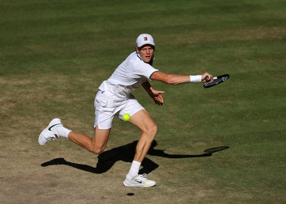 RECORD DATE NOT STATED 12th July 2026; All England Lawn Tennis and Croquet Club, London, England; Wimbledon Tennis Tournament, Final Day; Jannik Sinner (ITA) with a backhand shot to Alexander Zverev (GER) JohnxPatrickxFletcher