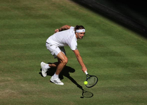 RECORD DATE NOT STATED 12th July 2026; All England Lawn Tennis and Croquet Club, London, England; Wimbledon Tennis Tournament, Final Day; Alexander Zverev (GER) with a backhand shot to Jannik Sinner (ITA) JohnxPatrickxFletcher