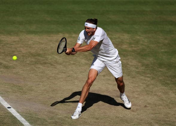 RECORD DATE NOT STATED 12th July 2026; All England Lawn Tennis and Croquet Club, London, England; Wimbledon Tennis Tournament, Final Day; Alexander Zverev (GER) with a backhand shot to Jannik Sinner (ITA) JohnxPatrickxFletcher