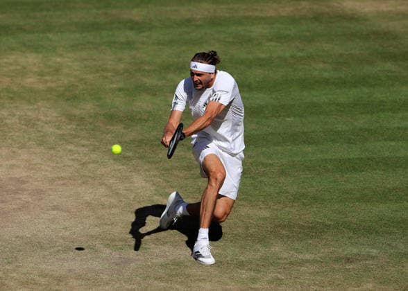 RECORD DATE NOT STATED 12th July 2026; All England Lawn Tennis and Croquet Club, London, England; Wimbledon Tennis Tournament, Final Day; Alexander Zverev (GER) with a backhand shot to Jannik Sinner (ITA) JohnxPatrickxFletcher