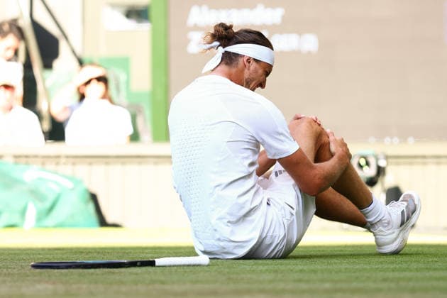 Sport Bilder des Tages Alexander Zverev falls during the Men s Singles final Wimbledon Tennis Championships, Day 14, The All England Lawn Tennis and Croquet Club, London, UK - 12 Jul 2026London The All England Lawn Tennis and United Kingdom  Copyright: xJamesxMarsh Shutterstockx 16981035gk