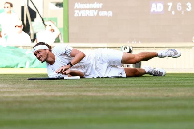 Alexander Zverev falls during the Men s Singles final Wimbledon Tennis Championships, Day 14, The All England Lawn Tennis and Croquet Club, London, UK - 12 Jul 2026London The All England Lawn Tennis and United Kingdom  Copyright: xJamesxMarsh Shutterstockx 16981035gm