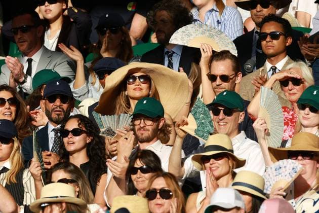 Jennifer Lopez, Tom Hiddleston and Andrew Garfield watching the action on Centre Court Wimbledon Tennis Championships, Day 14, The All England Lawn Tennis and Croquet Club, London, UK - 12 Jul 2026London The All England Lawn Tennis and United Kingdom  Copyright: xJamesxMarsh Shutterstockx 16981035he