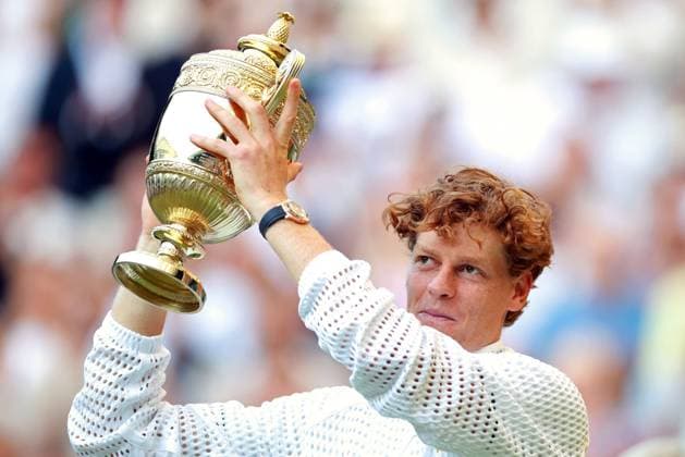 Jannik Sinner celebrates with the trophy after victory in the Men s Singles final Wimbledon Tennis Championships, Day 14, The All England Lawn Tennis and Croquet Club, London, UK - 12 Jul 2026London The All England Lawn Tennis and United Kingdom  Copyright: xJamesxMarsh Shutterstockx 16981035iv