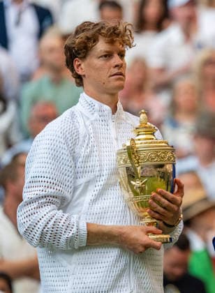 Tennis - Wimbledon Championship 2026 - Day 14 LONDON, ENGLAND - Sunday, July 12, 2026: Jannik Sinner (ITA) celebrates with the trophy after winning the Gentlemen s Singles Final match on Day Fourteen of The Championships Wimbledon 2026 at the All England Lawn Tennis and Croquet Club. (Photo by Kirsten Holst Propaganda) LONDON All England Lawn Tennis and Croq GREATER LONDON ENGLAND  Copyright: xKirstenxHolstx 2026-07-12-081-Wimbledon_Day_14
