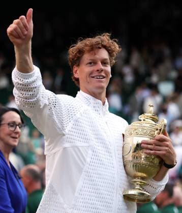 Jannik Sinner celebrates with the trophy after victory in the Men s Singles final Wimbledon Tennis Championships, Day 14, The All England Lawn Tennis and Croquet Club, London, UK - 12 Jul 2026London The All England Lawn Tennis and United Kingdom  Copyright: xEllaxLing Shutterstockx 16981034eh