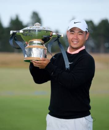 UK: The Genesis Scottish Open at The Renaissance Club, North Berwick, Scotland on 12 July 2026: Pictured: Tom Kim (South Korea) with the Genesis Scottish Open Championship 2026 trophy North Berwick The Renaissance Club Scotland Scotland Copyright: xAlexxToddx
