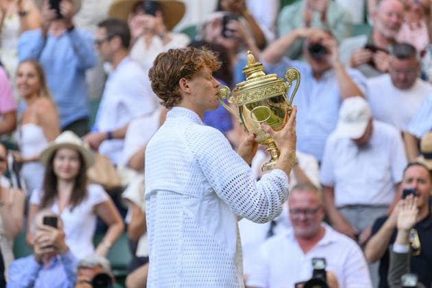 Jannik Sinner beats Alexander Zverev to hold onto Wimbledon men’s singles title LONDON, UNITED KINGDOM - July 12: Jannik Sinner of Italy holds the mens singles trophy after beating against Alexander Zverev of Germany during day 14 of The Wimbledon Tennis Championships at All England Lawn Tennis and Croquet Club on July 12, 2026 in London, United Kingdom. Ray Tang Anadolu London United Kingdom. Editorial use only. Please get in touch for any other usage.  Copyright: x2026xAnadoluxRayxTangx