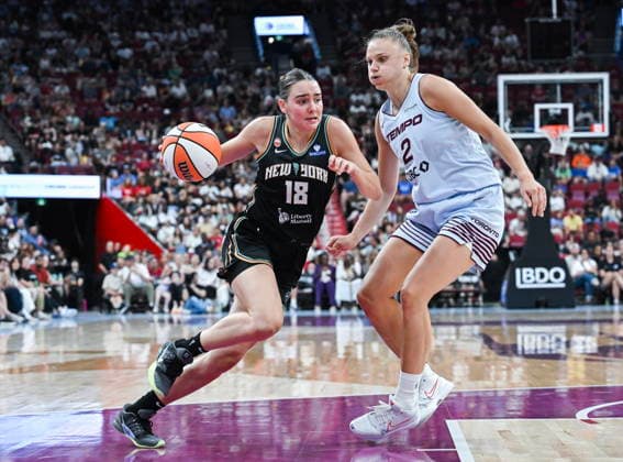 July 12, 2026, Montreal, Pq, Canada: Toronto Tempo s Laura Juskaite (2) defends against New York Liberty s Pauline Astier (18) as she drives to the basket during second half WNBA, Basketball Damen, USA basketball action in Montreal, on Sunday, July 12, 2026. Canada News - July 12, 2026  - ZUMAc35_ 20260712_zaf_c35_051 Copyright: xGrahamxHughesx