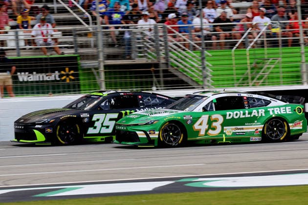 HAMPTON, GA - JULY 12: 43 Erik Jones, LEGACY MOTOR CLUB, Dollar Tree Toyota Camry passes 35 Riley Herbst, 23XI Racing, Monster Energy Toyota Camry during the NASCAR, Motorsport, USA Cup Series Quaker State 400 race on July 12, 2026 at EchoPark Speedway in Hampton, Georgia. (Photo by David J. Griffin Icon Sportswire) AUTO: JUL 12 NASCAR Cup Series Quaker State 400 EDITORIAL USE ONLY Icon9532607121501