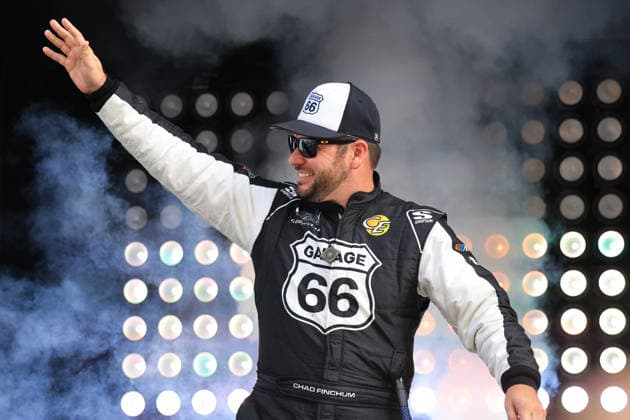 ATLANTA, GA - JULY 12: Chad Finchum ( 66 Garage 66 Carters Royal Dispos-all Ford) waves to the crowd during driver introductions prior to the running of the NASCAR, Motorsport, USA Cup Series Quaker State 400 on July 12, 2026 at EchoPark Speedway in Hampton, GA. (Photo by Jeff Robinson Icon Sportswire) AUTO: JUL 12 NASCAR Cup Series Quaker State 400 EDITORIAL USE ONLY Icon26071211581400