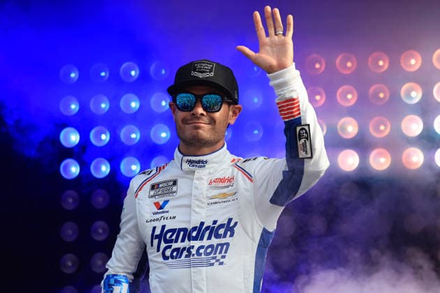 ATLANTA, GA - JULY 12: Kyle Larson ( 5 Hendrick Motorsports HendrickCars.com Chevrolet) waves to the crowd during driver introductions prior to the running of the NASCAR, Motorsport, USA Cup Series Quaker State 400 on July 12, 2026 at EchoPark Speedway in Hampton, GA. (Photo by Jeff Robinson Icon Sportswire) AUTO: JUL 12 NASCAR Cup Series Quaker State 400 EDITORIAL USE ONLY Icon26071212642400