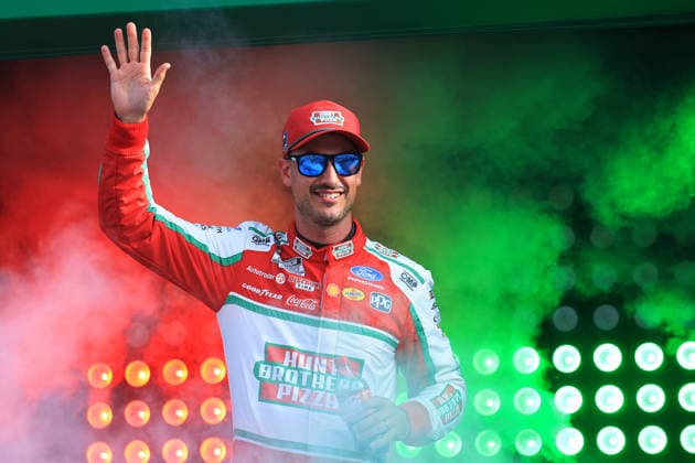 ATLANTA, GA - JULY 12: Joey Logano ( 22 Team Penske Hunt Brothers Pizza Ford) waves to the crowd during driver introductions prior to the running of the NASCAR, Motorsport, USA Cup Series Quaker State 400 on July 12, 2026 at EchoPark Speedway in Hampton, GA. (Photo by Jeff Robinson Icon Sportswire) AUTO: JUL 12 NASCAR Cup Series Quaker State 400 EDITORIAL USE ONLY Icon26071212686400