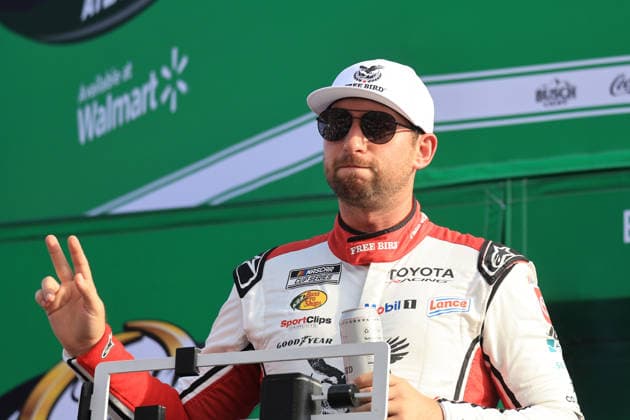 ATLANTA, GA - JULY 12: Chase Briscoe ( 19 Joe Gibbs Racing Freebird Spring Water Toyota) waves to the crowd during driver introductions prior to the running of the NASCAR, Motorsport, USA Cup Series Quaker State 400 on July 12, 2026 at EchoPark Speedway in Hampton, GA. (Photo by Jeff Robinson Icon Sportswire) AUTO: JUL 12 NASCAR Cup Series Quaker State 400 EDITORIAL USE ONLY Icon26071212774400