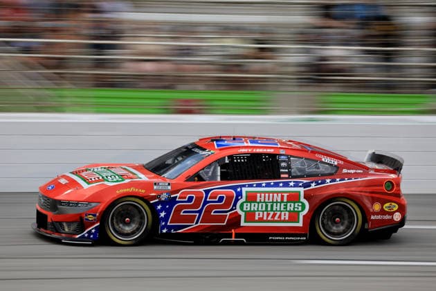 ATLANTA, GA - JULY 12: Joey Logano ( 22 Team Penske Hunt Brothers Pizza Ford) races into the tri-oval during the running of the NASCAR, Motorsport, USA Cup Series Quaker State 400 on July 12, 2026 at EchoPark Speedway in Hampton, GA. (Photo by Jeff Robinson Icon Sportswire) AUTO: JUL 12 NASCAR Cup Series Quaker State 400 EDITORIAL USE ONLY Icon26071213170400