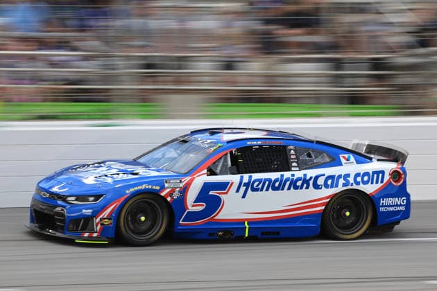 ATLANTA, GA - JULY 12: Kyle Larson ( 5 Hendrick Motorsports HendrickCars.com Chevrolet) races into the tri-oval during the running of the NASCAR, Motorsport, USA Cup Series Quaker State 400 on July 12, 2026 at EchoPark Speedway in Hampton, GA. (Photo by Jeff Robinson Icon Sportswire) AUTO: JUL 12 NASCAR Cup Series Quaker State 400 EDITORIAL USE ONLY Icon26071213252400