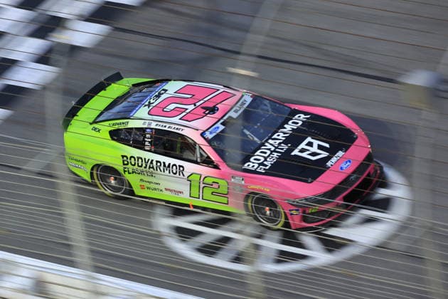 ATLANTA, GA - JULY 12: Ryan Blaney ( 12 Team Penske Body Armor Flash I.V. Ford) races into the tri-oval during the running of the NASCAR, Motorsport, USA Cup Series Quaker State 400 on July 12, 2026 at EchoPark Speedway in Hampton, GA. (Photo by Jeff Robinson Icon Sportswire) AUTO: JUL 12 NASCAR Cup Series Quaker State 400 EDITORIAL USE ONLY Icon26071213451400