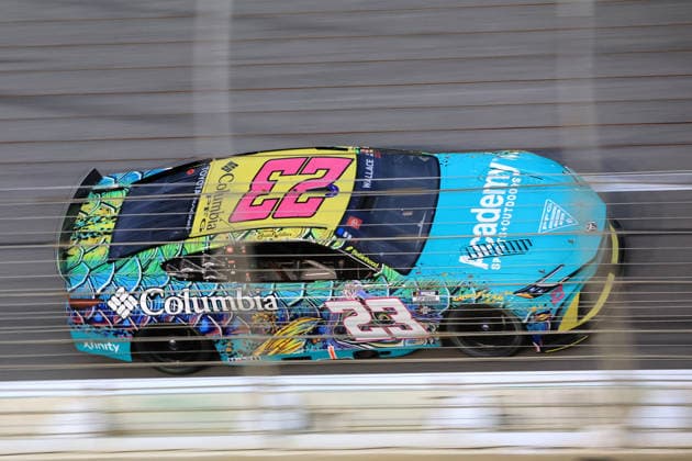 ATLANTA, GA - JULY 12: Bubba Wallace ( 23 23XI Racing Columbia PFG Academy Sports Toyota) races into the tri-oval during the running of the NASCAR, Motorsport, USA Cup Series Quaker State 400 on July 12, 2026 at EchoPark Speedway in Hampton, GA. (Photo by Jeff Robinson Icon Sportswire) AUTO: JUL 12 NASCAR Cup Series Quaker State 400 EDITORIAL USE ONLY Icon26071213497400