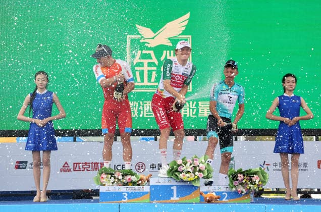 MENYUAN, CHINA - JULY 12: Gabriele Bessega (C) and Marco Manenti (R) of Team Bardiani-CSF-Faizane, along with Raman Tsishkou (L2) of Li-Ning Star Cycling Team, celebrate on the podium after finishing in the top three positions of the second stage of the 2026 25th Tour of Magnificent Qinghai International Road cycling, Rad, Radsport, Strasse Race on July 12, 2026 in Menyuan, Qinghai Province of China. The second stage of the 2026 25th Tour of Magnificent Qinghai International Road Cycling Race ran from Huangyuan to Menyuan.  Copyright: xChinaxNewsxServicex 111653853643