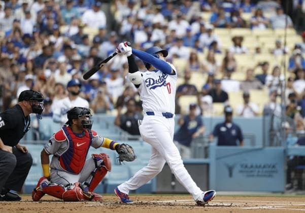 Baseball: Diamondbacks vs. Dodgers Los Angeles Dodgers designated hitter Shohei Ohtani hits a solo home run in the first inning of a baseball game against the Arizona Diamondbacks at Dodger Stadium in Los Angeles on July 12, 2026, marking the 350th homer of his career spanning Nippon Professional Baseball and Major League Baseball.  A14AA0005622859P