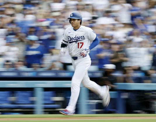 Baseball: Diamondbacks vs. Dodgers Los Angeles Dodgers designated hitter Shohei Ohtani rounds the bases after hitting a solo home run in the first inning of a baseball game against the Arizona Diamondbacks at Dodger Stadium in Los Angeles on July 12, 2026. It marked the 350th homer of his career spanning Nippon Professional Baseball and Major League Baseball.  A14AA0005622870P