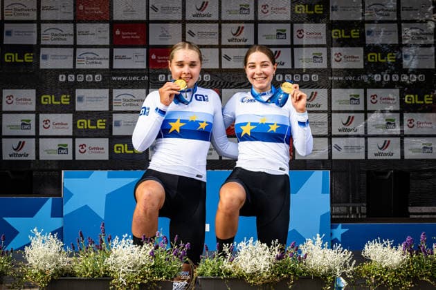 KOSTINA Olga, NOVOLODSKAYA Angelina: UEC Track cycling, Rad, Radsport, Bahnrad, Bahn European Championships U19 U23 Cottbus 2026 Black - KOSTINA Olga - Red - NOVOLODSKAYA Angelina ( RUS ) Russia Winner - First Place - Award Ceremony - Medal Ceremony - Podium - Querformat - quer - horizontal - Landscape - Event Veranstaltung: UEC Track Cycling European Championships 2026 U19 U23 - Category Kategorie: Cycling - Track Cycling European Championships - Location Ort: Europe - Germany - Brandenburg - Cottbus - Lausitz Velodrom - Discipline: Madison - Category: Elite Women - U19 - Distance: 20 km - Date Datum: 12.07.2026 Sunday Day 6 - *** KOSTINA Olga, NOVOLODSKAYA Angelina UEC Track Cycling European Championships U19 U23 Cottbus 2026 Black KOSTINA Olga Red NOVOLODSKAYA Angelina RUS Russia Winner First Place Award Ceremony Medal Ceremony Podium Landscape Format Landscape Event UEC Track Cycling European Championships 2026 U19 U23 Category Cycling Track Cycling European Championships Location Europe Germany Brandenburg Cottbus Lausitz Velodrom Discipline Madison Category Elite Women U19 Distance 20 km Date July 12, 2026 Sunday Day 6