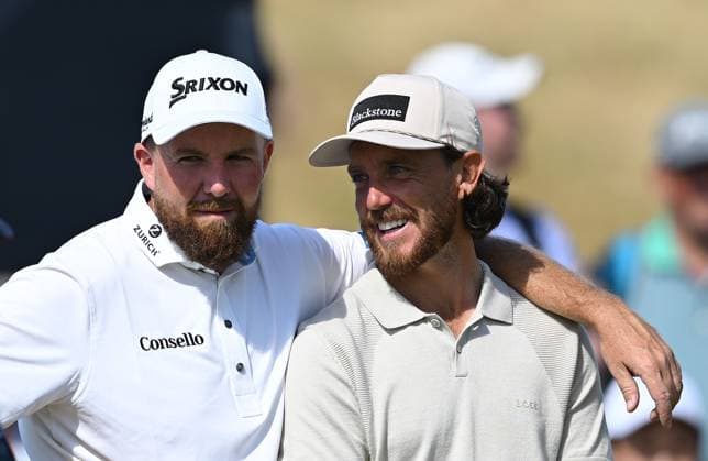 Shane Lowry (IRE) and Tommy Fleetwood (ENG) embrace on the Putting Green 154th Open Golf Championships, Royal Birkdale, Southport, UK - 13 Jul 2026Southport Royal Birkdale United Kingdom  Copyright: xGreigxCowie Shutterstockx 16988288cc