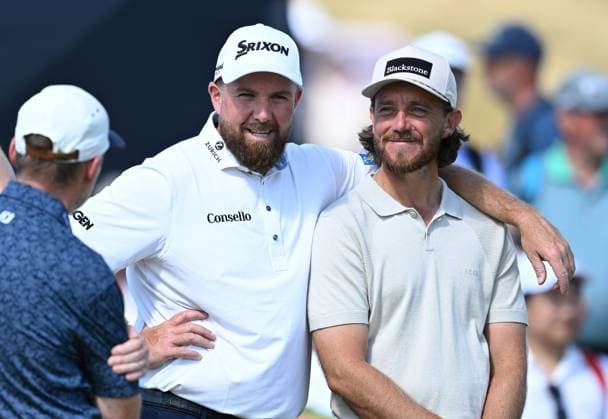 Shane Lowry (IRE) and Tommy Fleetwood (ENG) embrace on the Putting Green 154th Open Golf Championships, Royal Birkdale, Southport, UK - 13 Jul 2026Southport Royal Birkdale United Kingdom  Copyright: xGreigxCowie Shutterstockx 16988288ce