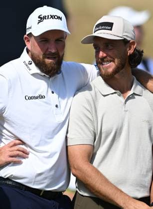 Shane Lowry (IRE) and Tommy Fleetwood (ENG) embrace on the Putting Green 154th Open Golf Championships, Royal Birkdale, Southport, UK - 13 Jul 2026Southport Royal Birkdale United Kingdom  Copyright: xGreigxCowie Shutterstockx 16988288ca