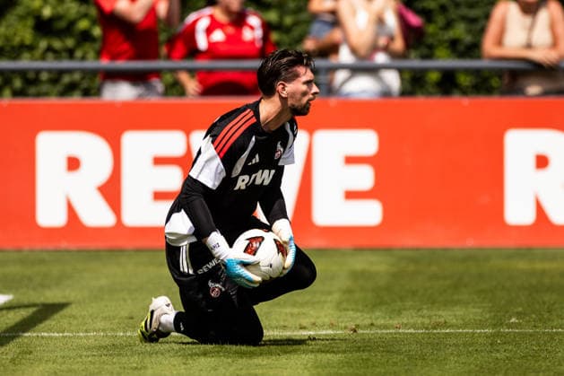 COLOGNE, GERMANY - JULY 13: Ron-Robert Zieler (1. FC Koeln, 20) holding a ball during the first training session of season 2026 27 at Geissbockheim on July 13, 2026 in Cologne, Germany. North Rhine Westphalia Germany Copyright: xSteffiexWunderlx