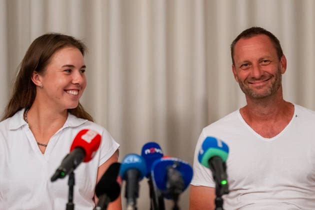 Wimbledon champion Linda Noskova left, and her coach Tomas Krupa attend a press conference, PK, Pressekonferenz in Prague after returning from London on July 13, 2026. (CTKxPhoto OndrejxDeml) CTKPhotoP2026071305767  CTKPhotoP2026071305767