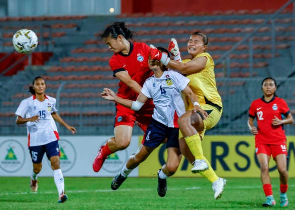 July 13, 2026, Kuala Lumpur, Malaysia: Vilayphone Phengsana (C) and Phatthalavady Sophothirath of Laos (R) seen in action during the AFF Women s Cup 2026 match between Singapore and Laos at Kuala Lumpur Football Stadium, Cheras. Final score Singapore 1 : 1 Laos Kuala Lumpur Malaysia - ZUMAs197 20260713_aaa_s197_208 Copyright: xWongxFokxLoyx