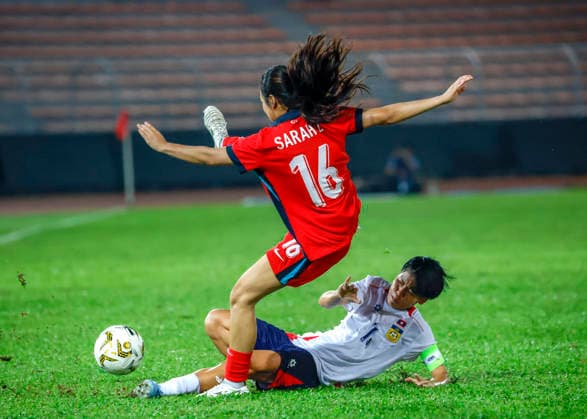 July 13, 2026, Kuala Lumpur, Malaysia: Nur Sarah of Singapore (L) and Saysamone Inthaphone of Laos seen in action during the AFF Women s Cup 2026 match between Singapore and Laos at Kuala Lumpur Football Stadium, Cheras. Final score Singapore 1 : 1 Laos AFF Women s Cup 2026 Singapore Vs Laos In Kuala Lumpur, Malaysia - 13 Jul 2026  - ZUMAs197 20260713_aaa_s197_209 Copyright: xWongxFokxLoyx