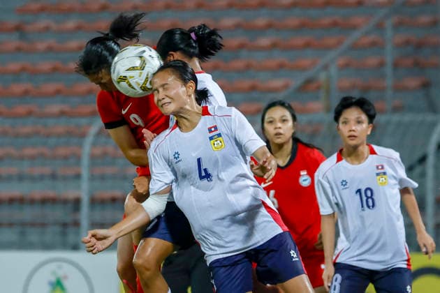 July 13, 2026, Kuala Lumpur, Malaysia: Vilayphone Phengsana of Laos (R) and Danelle Tan Li Ern of Singapore (L) seen in action during the AFF Women s Cup 2026 match between Singapore and Laos at Kuala Lumpur Football Stadium, Cheras. Final score Singapore 1 : 1 Laos AFF Women s Cup 2026 Singapore Vs Laos In Kuala Lumpur, Malaysia - 13 Jul 2026  - ZUMAs197 20260713_aaa_s197_218 Copyright: xWongxFokxLoyx