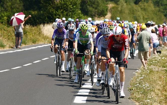 The pack of riders pictured in action during the stage 10 of the 2026 Tour de France cycling race, a stage of 167km from Aurillac to Le Lioran, on Tuesday 14 July 2026. The 113th edition of the Tour de France starts on Saturday 4 July in Barcelona, Spain, and will finish in Paris, France on the 26th of July. POOLxLUCAxBETTINI  x181114162x