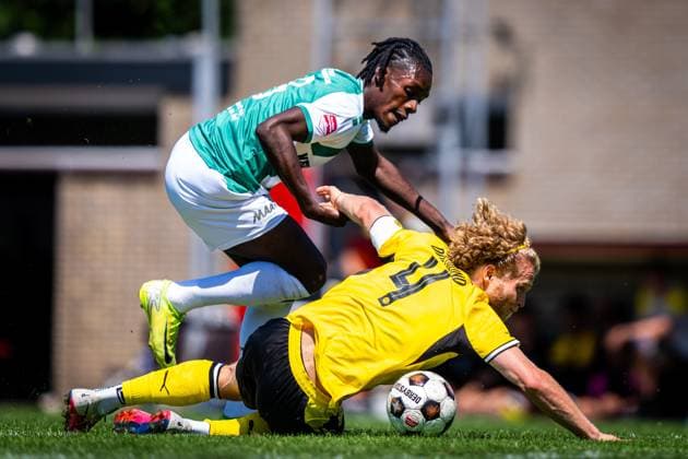 PAPENDRECHT , 14-07-2026 , Sportpark Slobbengors , season 2026 2027 , Dutch Preseason football , match between FC Dordrecht and Borussia Dortmund II , picture shows FC Dordrecht player Yunus Younous and Borussia Dortmund II player Jesper Verlaat Dordrecht - Borussia Dortmund II (friendly)  x205022375x Copyright: