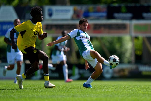Friendly: FC Dordrecht v Borussia Dortmund II Papendrecht - Nanitonda Quiala of Borussia Dortmund II, Ayoub Ouarghi of FC Dordrecht during a friendly match in preperation of the 2026 2027 season. The match is set between FC Dordrecht and Borussia Dortmund II at V.V. Papendrecht on 14 July 2026 in Papendrecht, The Netherlands. (Hero Images Nick Koole) Copyright: xNickxKoolex