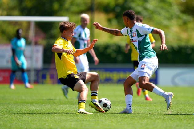 Friendly: FC Dordrecht v Borussia Dortmund II Papendrecht - Jaden Pinas of FC Dordrecht duels for the ball against Tim Degener of Borussia Dortmund II during a friendly match in preperation of the 2026 2027 season. The match is set between FC Dordrecht and Borussia Dortmund II at V.V. Papendrecht on 14 July 2026 in Papendrecht, The Netherlands. (Hero Images Nick Koole) Copyright: xNickxKoolex