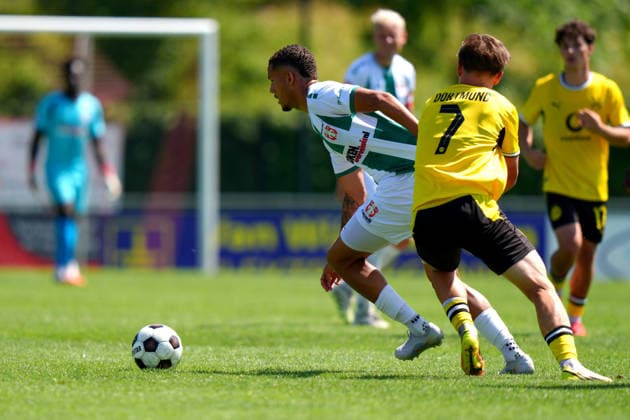 Friendly: FC Dordrecht v Borussia Dortmund II Papendrecht - Jaden Pinas of FC Dordrecht duels for the ball against Tim Degener of Borussia Dortmund II during a friendly match in preperation of the 2026 2027 season. The match is set between FC Dordrecht and Borussia Dortmund II at V.V. Papendrecht on 14 July 2026 in Papendrecht, The Netherlands. (Hero Images Nick Koole) Copyright: xNickxKoolex