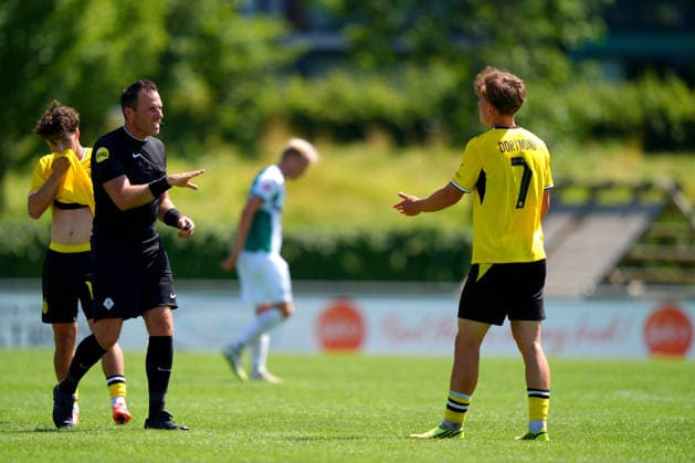 Friendly: FC Dordrecht v Borussia Dortmund II Papendrecht - Tim Degener of Borussia Dortmund II, Referee Pieter van Veelen during a friendly match in preperation of the 2026 2027 season. The match is set between FC Dordrecht and Borussia Dortmund II at V.V. Papendrecht on 14 July 2026 in Papendrecht, The Netherlands. (Hero Images Nick Koole) Copyright: xNickxKoolex