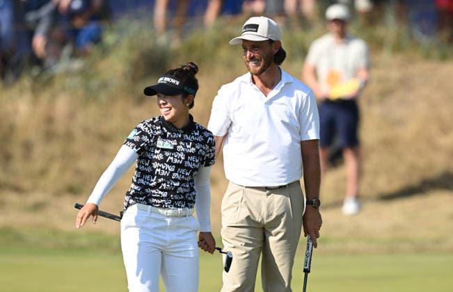 Miyu Yamashita of Japan High fives Tommy Fleetwood (ENG) in the Hero challenge 154th Open Golf Championships, Royal Birkdale, Southport, UK - 14 Jul 2026Southport Royal Birkdale United Kingdom  Copyright: xGreigxCowie Shutterstockx 16988289ej