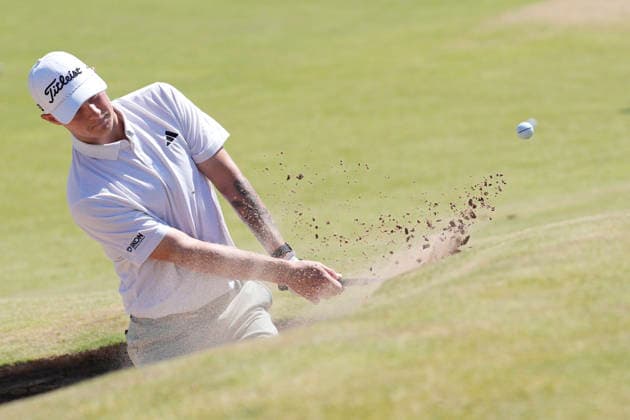 SOUTHPORT, ENGLAND - JULY 14: Cameron John (AUS) plays from a bunker on the 6th green during practice of the 154th Open Championship at the Royal Birkdale, Southport on July 14, 2026 in Merseyside, England The 154th British Open Championship