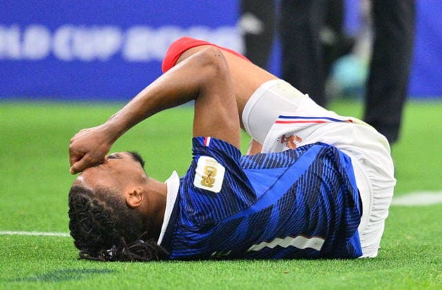 FIFA World Cup, WM, Weltmeisterschaft, Fussball 2026 semifinals - France vs Spain Michael Olise of France lies on the pitch during the FIFA World Cup 2026 semifinals match France against Spain, in Dallas, USA, 14 July 2026. DALLAS United States  Copyright: xSAMxWASSONx