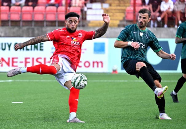 UEFA Champions League First Qualifying Round Second Leg, Inver Park, Belfast, Northern Ireland 14 7 2026 Larne vs Tre Fiori Larne™s Montel Gibson with Tre Fiori™s Tom Syku Montel Gibson with Tom Syku 14 7 2026  Copyright: xStephenxHamilton Inphox Larne v Tre Fiori-016