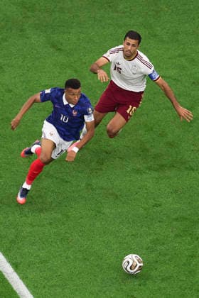 (260715) -- DALLAS, July 15, 2026 -- Kylian Mbappe (L) of France breaks through during the semifinal match between France and Spain at the 2026 FIFA World Cup, WM, Weltmeisterschaft, Fussball at Dallas Stadium in Dallas, the United States, July 14, 2026. ) (SP)U.S.-DALLAS-FOOTBALL-FIFA WORLD CUP-SEMIFINAL-FRA VS ESP HuxXingyu 