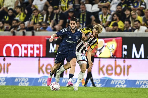 LASK Linz v Fenerbahce - Friendly LINZ, AUSTRIA - JULY 14: Ismail Yuksek (L) of Fenerbahce in action against Jonas Ilk (R) of LASK Linz during a friendly match between LASK Linz and Fenerbahce as part of Fenerbahce’s pre-season training camp at Raiffeisen Arena in Linz, Austria, on July 14, 2026. Agit Erdi Ulukaya Anadolu Linz Austria. Editorial use only. Please get in touch for any other usage.  Copyright: x2026xAnadoluxAgitxErdixUlukayax