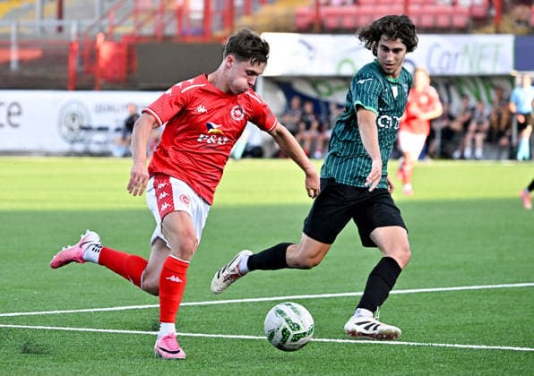 UEFA Champions League First Qualifying Round Second Leg, Inver Park, Belfast, Northern Ireland 14 7 2026 Larne vs Tre Fiori Larne™s Matty Lusty with Tre Fiori™s Mattia Sancisi Matty Lusty with Mattia Sancisi 14 7 2026  Copyright: xStephenxHamilton Inphox Larne v Tre Fiori-027